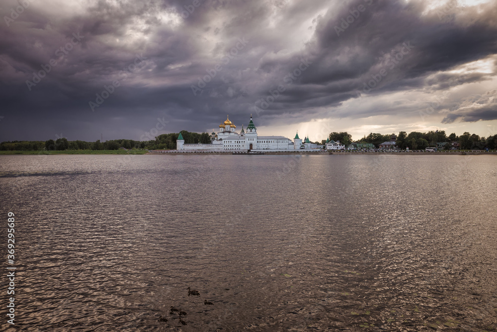 Holy Trinity Ipatiev monastery under a thundercloud in the city of Kostroma on the Bank of the Kostroma river. Gold ring of Russia. Holy Trinity Ipatiev monastery under a thundercloud in the city of Kostroma on the Bank of the Kostroma river. Gold ring of Russia.