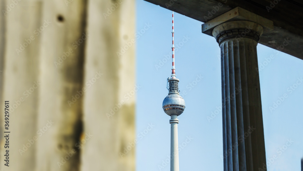 View between pillars of the TV tower at Alexander Platz in Berlin Mitte tourism contrarian architecture metropolis vacation in germany cultural trip urban landmark vacation after the pandemic