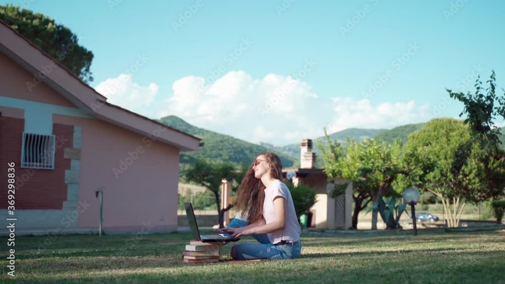Concept of business people, creation and preparation of startup and applications for mobile phone, working online at home using laptop. Businesswoman working outdoors on sunlight background