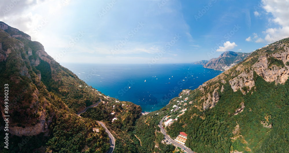 Aerial view of Laurito, Positano - curve mountain road. Sunny summer day with blue sky, clear sea of Sorrento coast. Travel and vacation, Europe