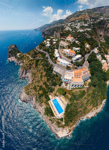 Aerial view of Conca dei Marini,Tovere. Beautiful bay and famous resort near Amalfi, Torre Capo di Conca. Travel and vacation. vertical photo. Italy, Europe photo