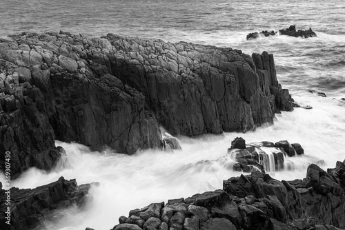Long exposure of waves crashing on rocks. Tojinbo Cliff, Fukui prefecture, japan