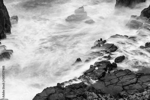 Long exposure of waves hitting the sea shore. Tojinbo Cliff, Fukui prefecture, japan
