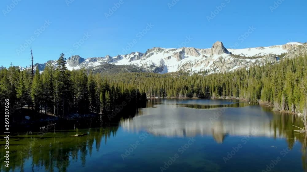 Cinematic aerial shot of alpine lake in Mammoth Lakes in California Cinematic aerial shot of alpine lake in Mammoth Lakes in California