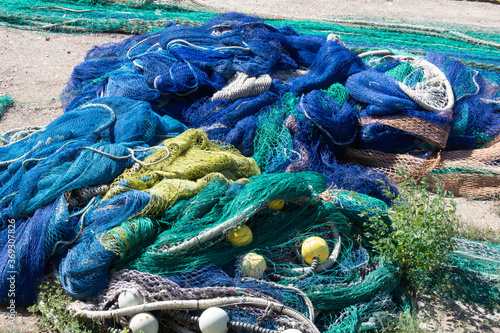 Multicoloured fishing nets and floats