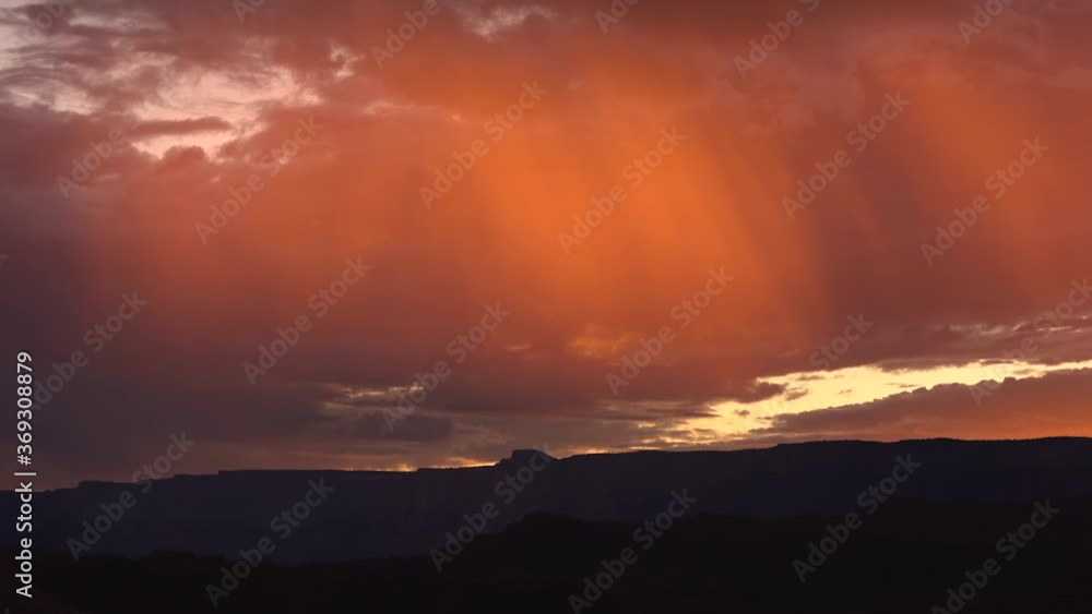 Time lapse of sunset illuminating downpour over Horseshoe Bend in Arizona Time lapse of sunset illuminating downpour over Horseshoe Bend in Arizona