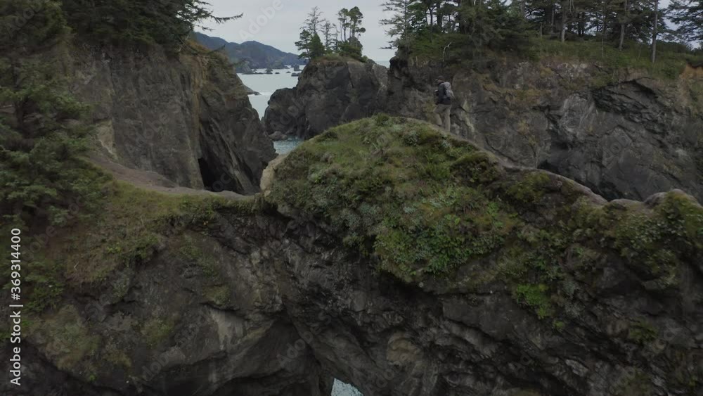 Cinematic aerial flyover of scenic Oregon coast in Pacific Northwest Cinematic aerial flyover of scenic Oregon coast in Pacific Northwest