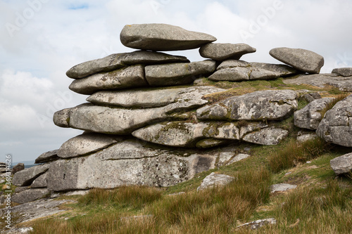 The Cheesewring stone cairns, a pile of large flat stones in Cornwall, UK photo