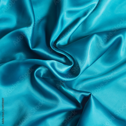 Фотография Blue satin texture close up