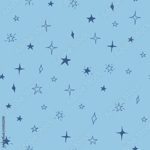 Stars seamless pattern design hand-drawn on blue background. Space  universe - fabric wrapping  textile  wallpaper  apparel design. 
