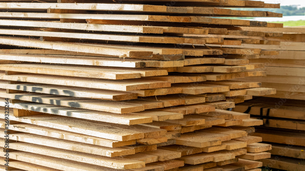 Wooden planks are laid with the end part stacked on top of each other Wooden planks are laid with the end part stacked on top of each other