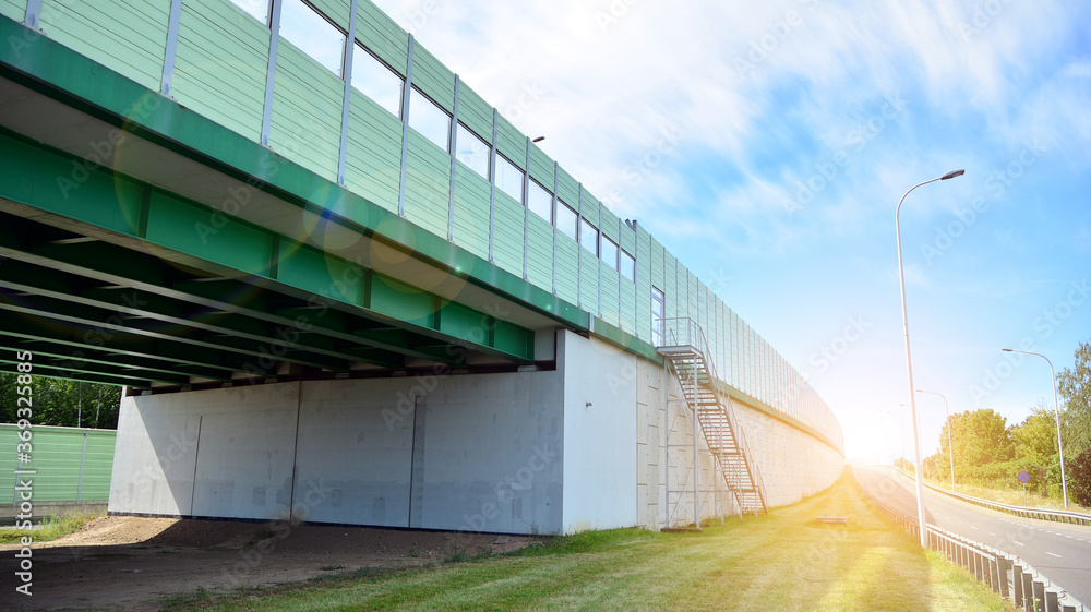 Modern road and road infrastructure. Empty road background in the city. Landscape with sunlight. Modern road and road infrastructure. Empty road background in the city. Landscape with sunlight.