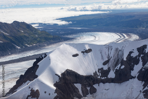 an aerial view of glaciers, rivers of ice,  in the Alaska Range, Alaska, USA