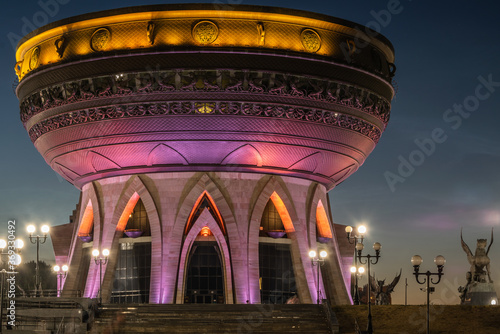 Night view of Kazan Wedding Palace in form of bowl with illumination