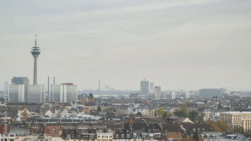 Sunny Duesseldorf cityscape and Rhine Tower, North Rhine-Westphalia, Germany Sunny Duesseldorf cityscape and Rhine Tower, North Rhine-Westphalia, Germany