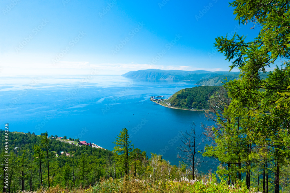 Looking over the Angara River and Lake Baikal from the Chersky Peak in the Listvyanka village. 