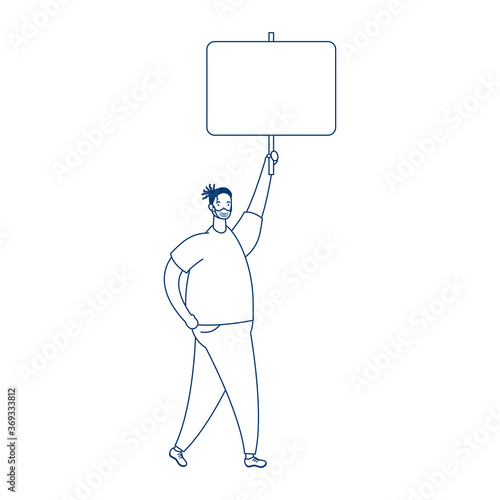 man wearing medical mask protesting with placard