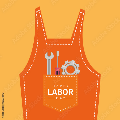 happy labor day celebration with tools in overalls pocket