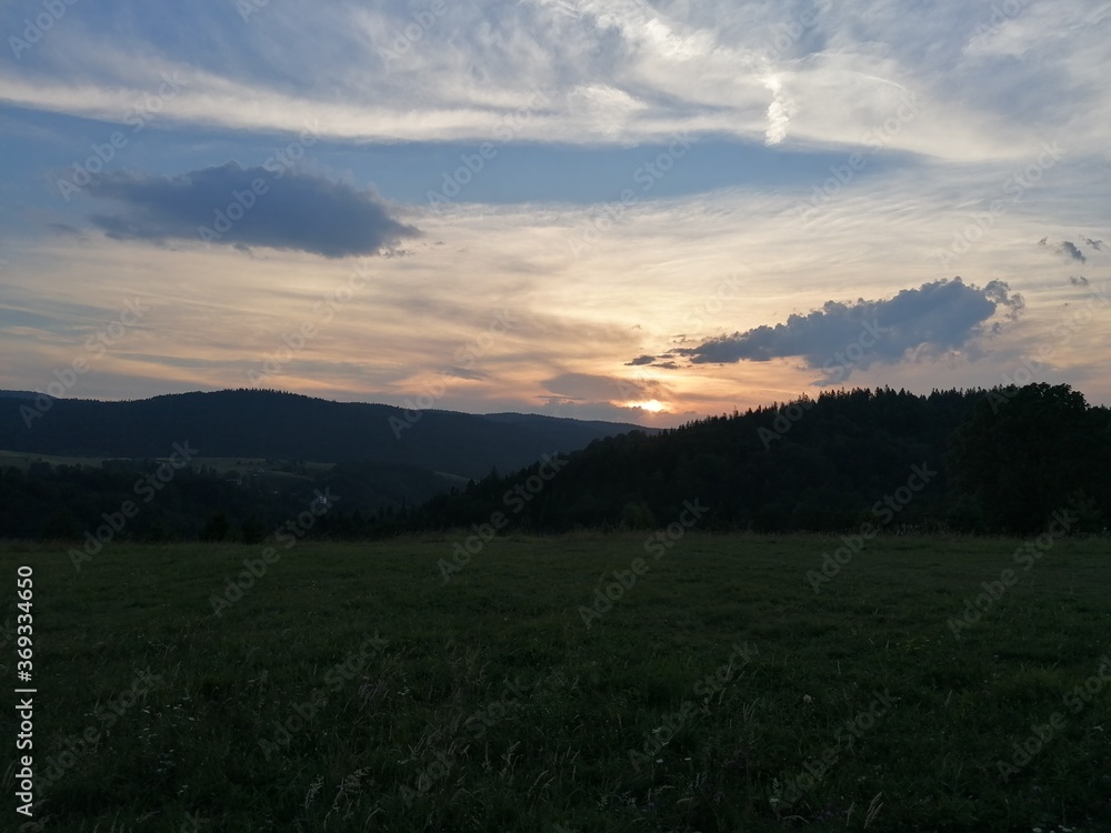 Fototapeta premium sunset over the mountains