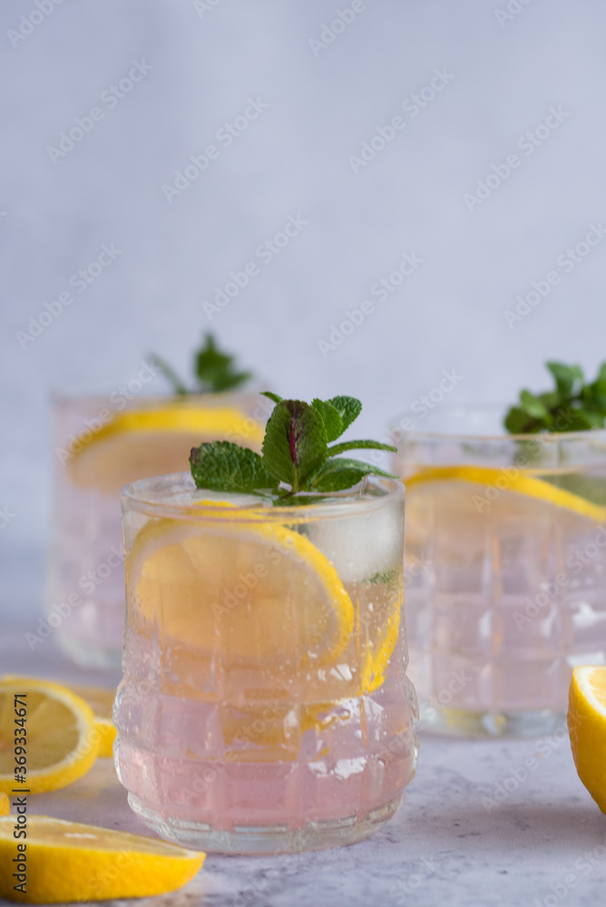 Fototapeta premium Summer fresh drinks. Homemade rose lemonade in a glass