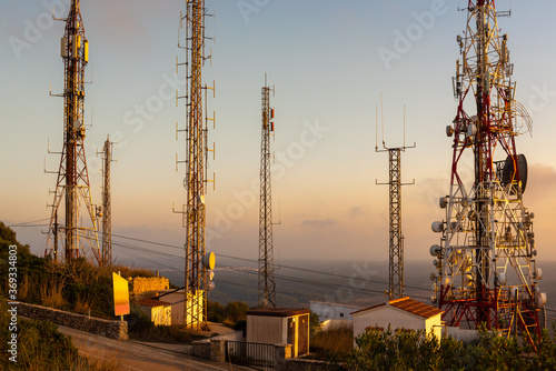 Telecommunications masts - directional mobile phone antenna dishes.