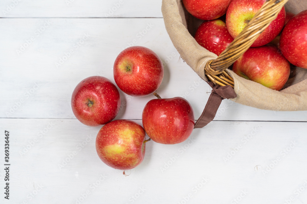 red juicy fresh apples on wooden background red juicy fresh apples on wooden background