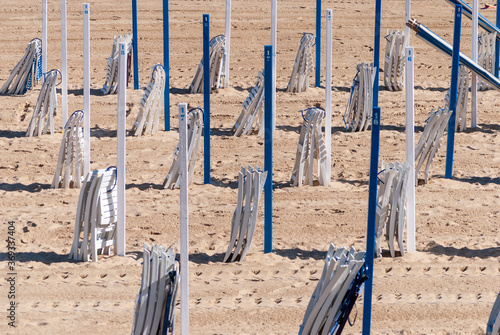 Chairs on the beach at sunrise