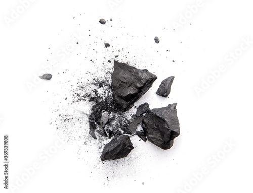 Fotobehang Pieces of broken black coal isolated on white background