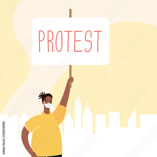 afro man wearing medical mask protesting with placard