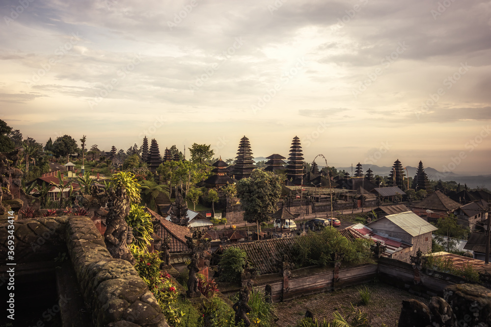 Bali Pura Besakih temple towers scenery from high viewpoint on horizon during sunset as Bali travel lifestyle