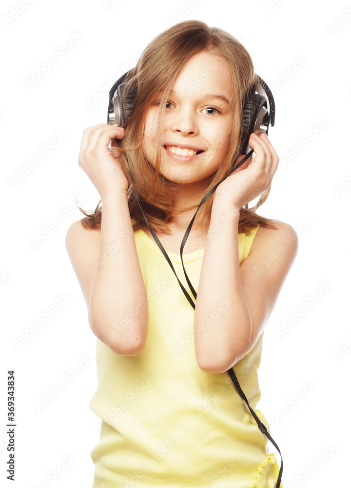 The girl is holding the headphones The girl is holding the headphones