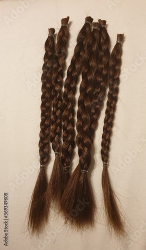 brown hair in braids. Cut and ready to go on wigs