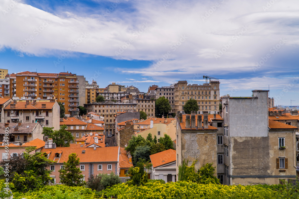 Horizontal view of Trieste, Italy with traditional houses and residential blocks from San Giusto hill