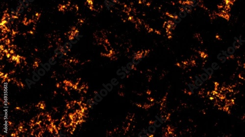 Orange fire glare flickers chaotically on a dark background