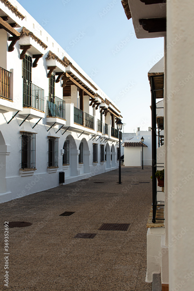 Conil de la Frontera, Spain-16.15.2020: Andalusian town street in Conil de la frontera with white houses