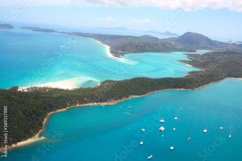 Aerial view of the Hill Inlet at Whitehaven Beach, with turquoise blue sea and the whitest sand of the world, on Whitesunday Island, Queensland photo