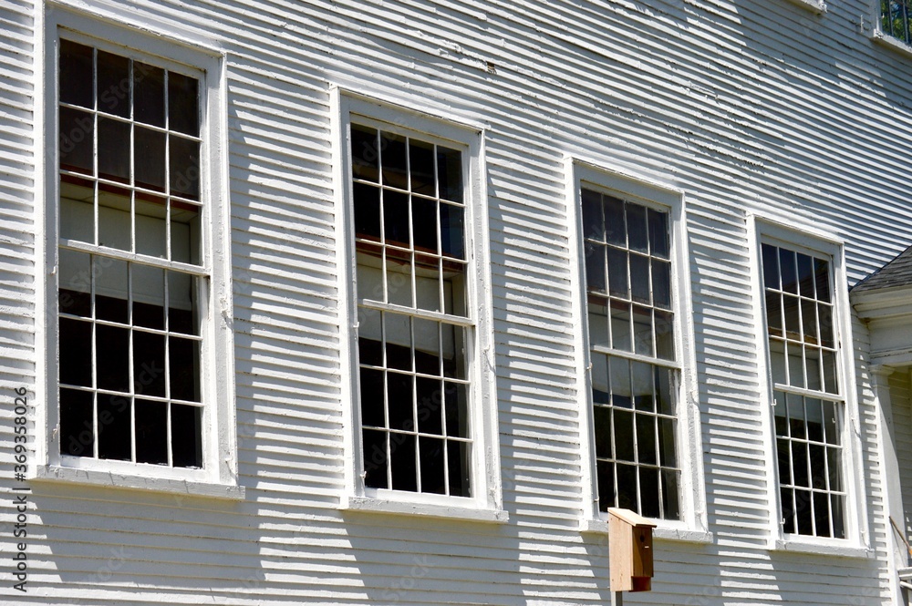 large windows on colonial church
