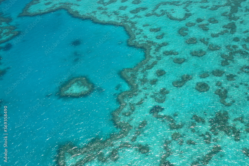 Obraz premium Aerial View over the Heart Reef in the Great Barrier Reef from air, in Queensland, Australia.