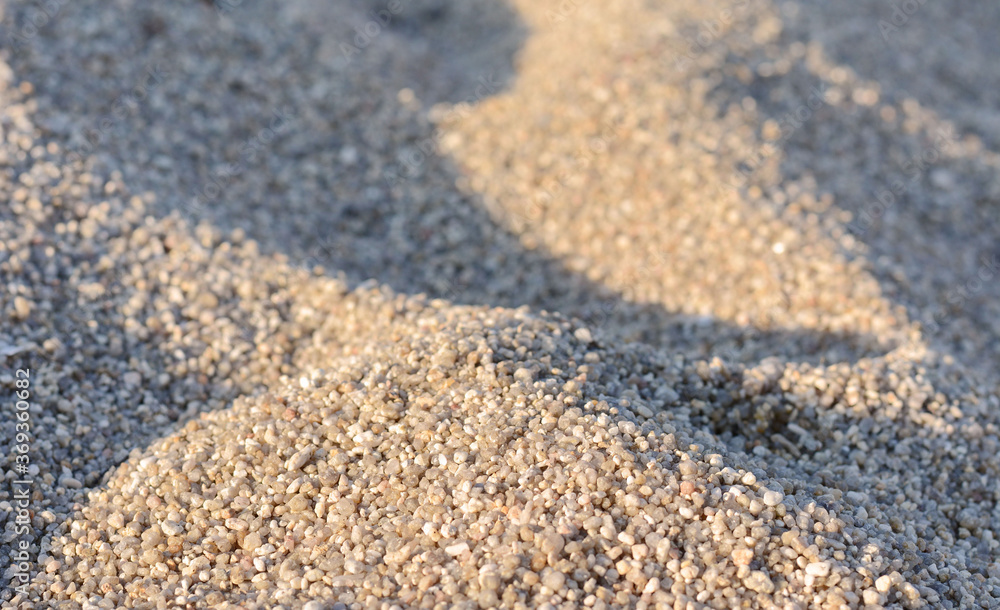 Golden Sand on the beach as background. Sand Texture. Golden sand. Background from fine sand. Golden Sand on the beach as background. Sand Texture. Golden sand. Background from fine sand.