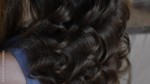 Hairdresser working with woman in beauty salon, closeup