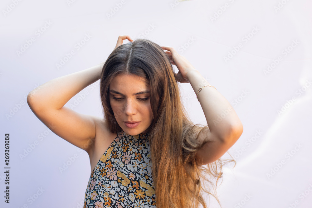 Naklejka premium cute girl playing with her hair