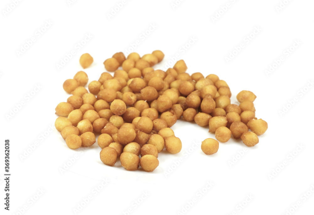 Fried batter pearls in a clay bowl. Crispy pearls. A soup topping and snack product made from flour, vegetable fat and yeast. Isolated macro food photo close up from above on white background. Fried batter pearls in a clay bowl. Crispy pearls. A soup topping and snack product made from flour, vegetable fat and yeast. Isolated macro food photo close up from above on white background.