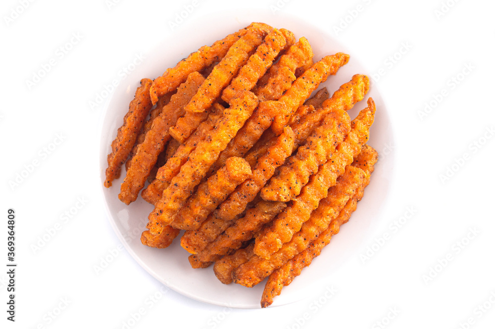 Crinkle Sweet Potatoe Fries on a White Background Crinkle Sweet Potatoe Fries on a White Background