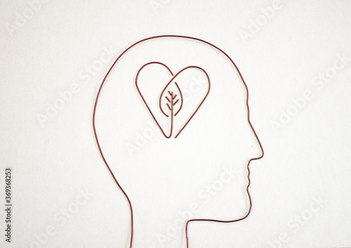 human head silhouette with heart