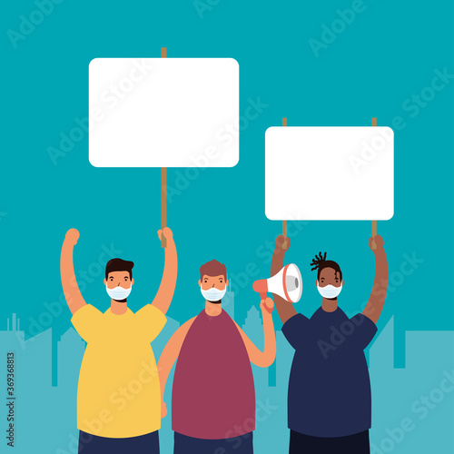 interracial men wearing medical masks protesting with placard and megaphone
