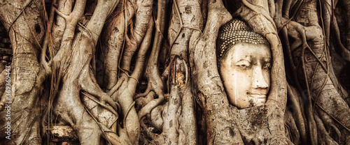 Buddha decay , THAILAND Ruins and Antiques at the Ayutthaya Historical Park , banner