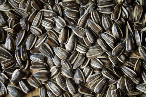 Background from striped seeds. Grocery background.