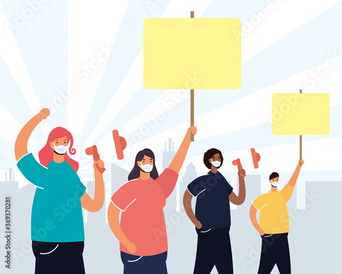 persons wearing medical masks protesting with placard and megaphone