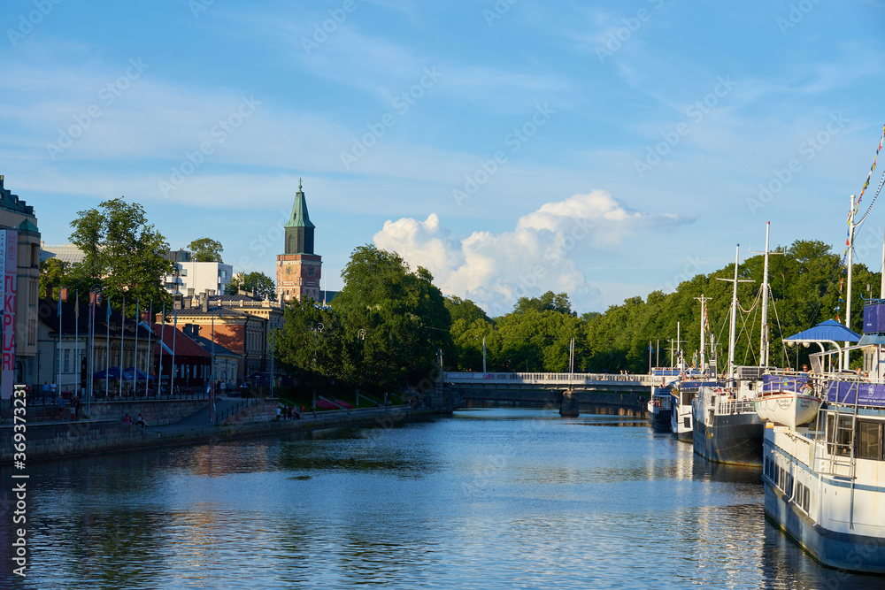 A view on Aura river with Turku Cathedral on a background.