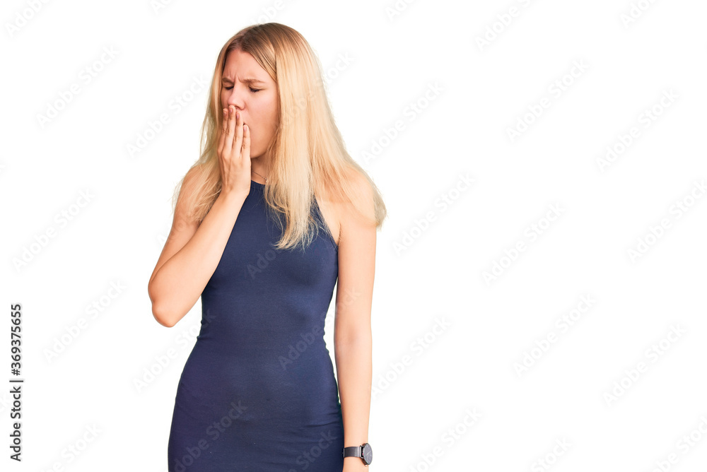 Young beautiful blonde woman wearing casual dress bored yawning tired covering mouth with hand. restless and sleepiness. Young beautiful blonde woman wearing casual dress bored yawning tired covering mouth with hand. restless and sleepiness.